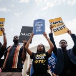 Protesters rally outside of the Supreme Court after the nation's high court stuck down President Biden's student debt relief program