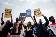 Protesters rally outside of the Supreme Court after the nation's high court stuck down President Biden's student debt relief program