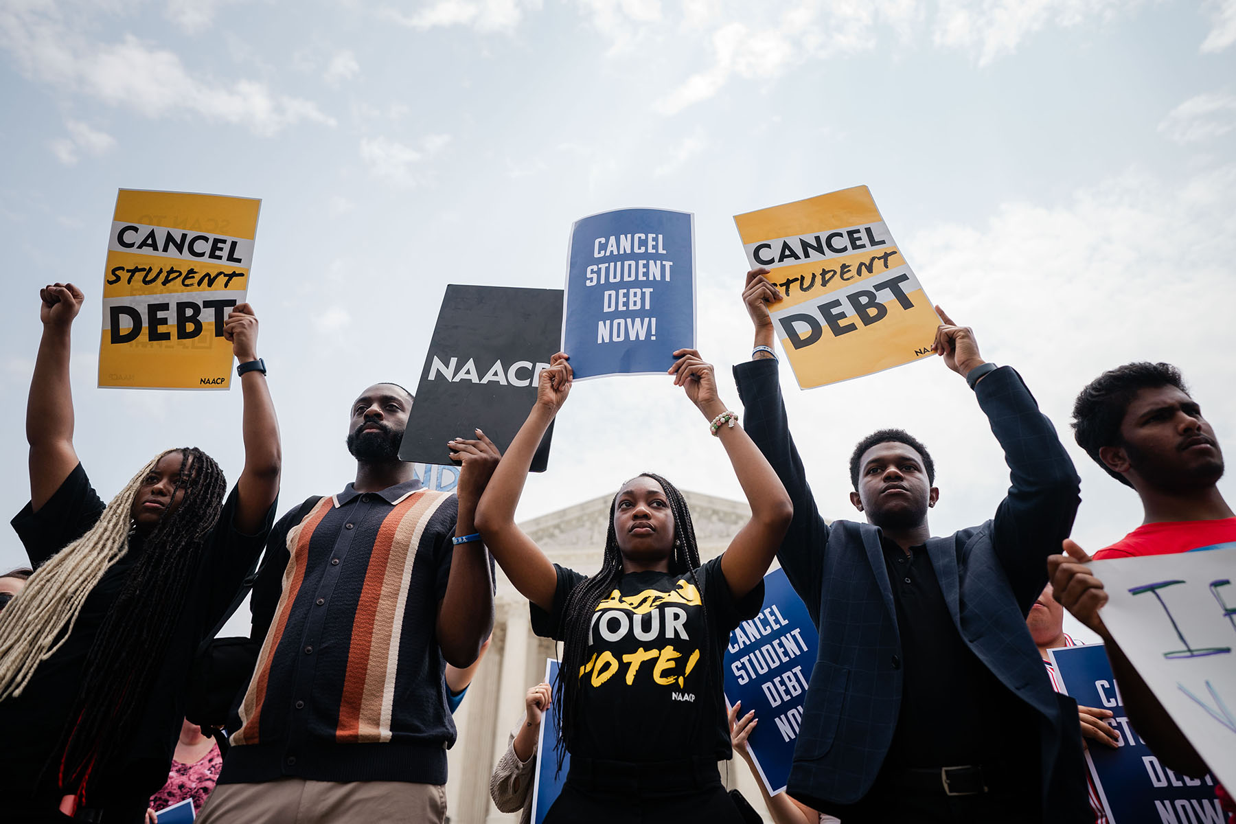 Protesters rally outside of the Supreme Court after the nation's high court stuck down President Biden's student debt relief program