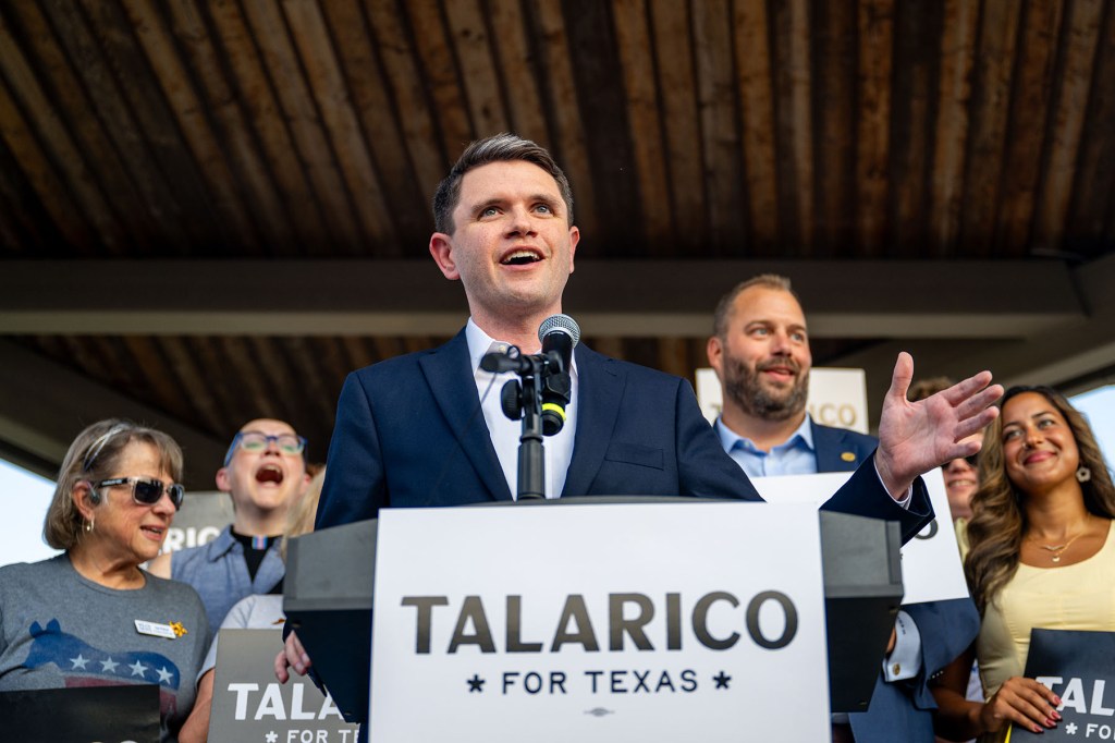 Texas State Rep. James Talarico speaks at a podium during a campaign launch rally.