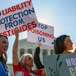 Protesters stand outside the U.S. Supreme Court holding signs that read “No liability protection from pesticides,” and “Stop poisoning us.”