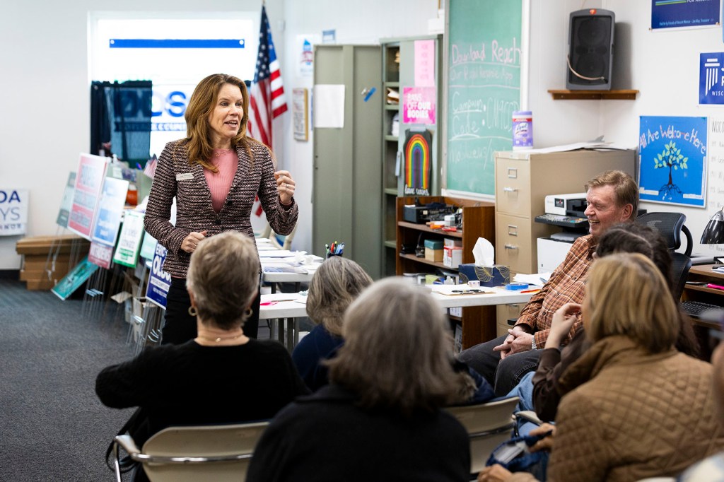 Wisconsin Appeals Court Judge Chris Taylor speaks to supporters while campaigning at the Portage County Democratic Party office.