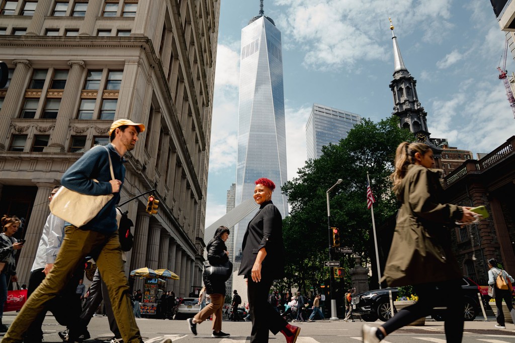 Allison Julien walks through a busy Manhattan street near the National Domestic Workers Alliance headquarters.