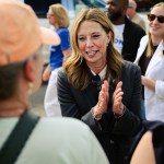 Dr. Amy Acton speaks with supporters during a rally.
