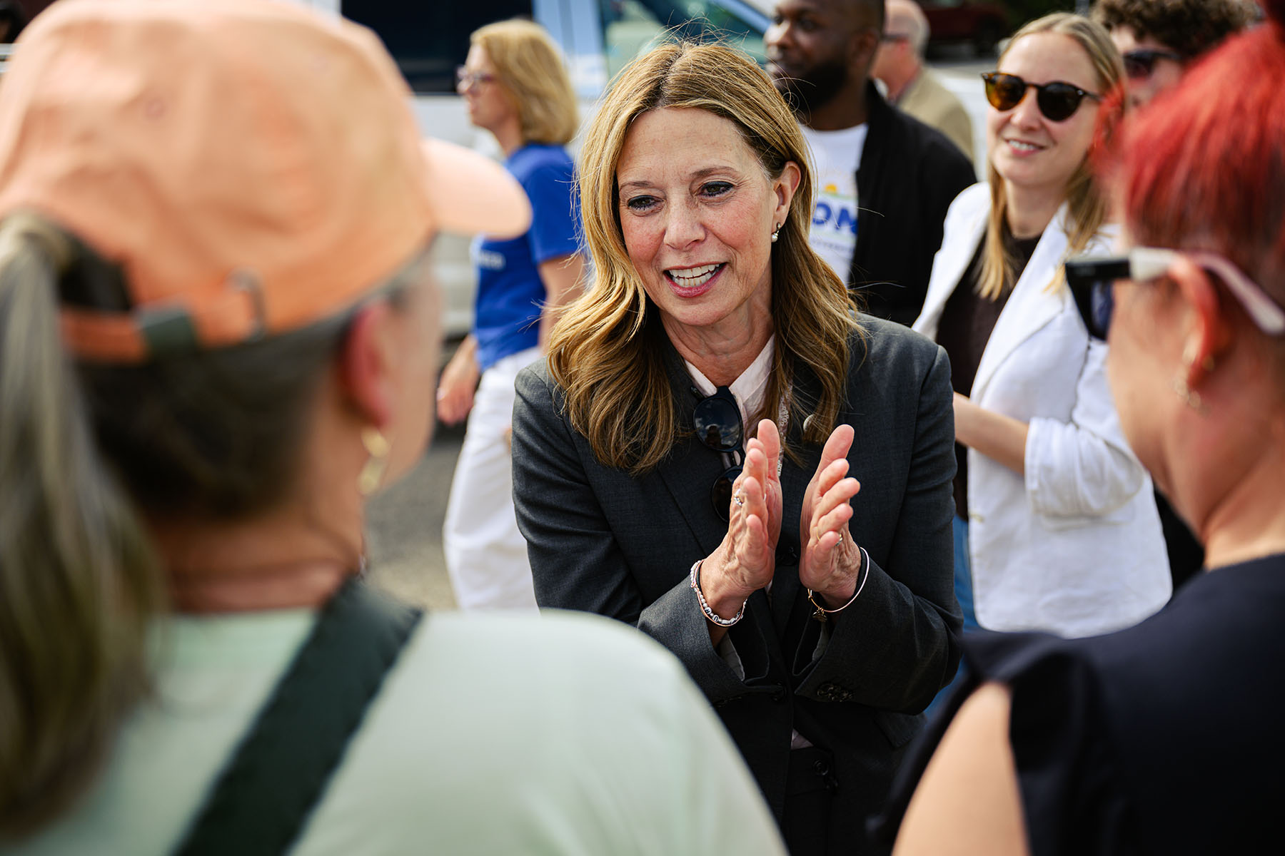 Dr. Amy Acton speaks with supporters during a rally.