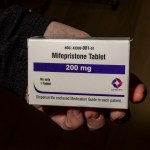 A white box with the label mifepristone tablet, 200 mg