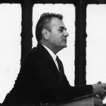 Black and white images of Congressman Barney Frank delivering remarks at a podium.