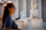 The marble statue Contemplation of Justice is seen outside the Supreme Court building.