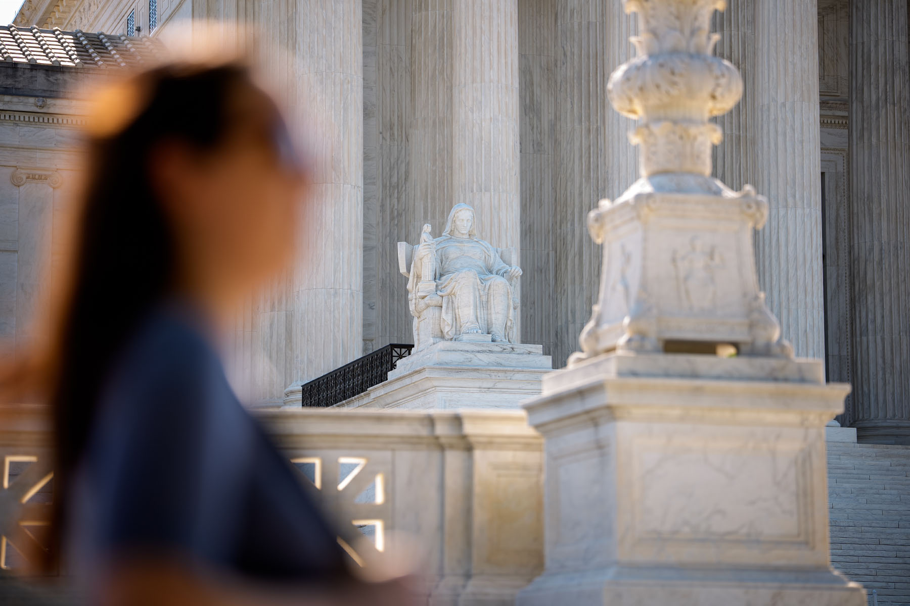 The marble statue Contemplation of Justice is seen outside the Supreme Court building.