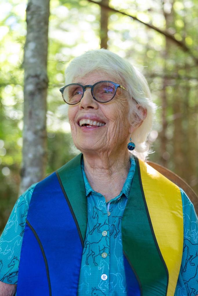 Rev. Heyward Carter sits outside her home near Brevard, North Carolina.