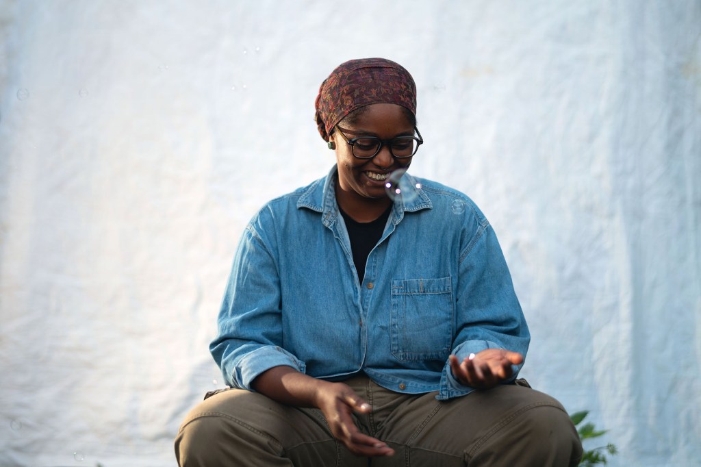 Mo Turner sits for a candid portrait image.