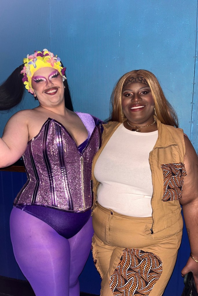 Two people pose for a portrait.