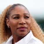 Serena Williams smiles as she speaks to the press at the All England Lawn Tennis and Croquet Club, London.