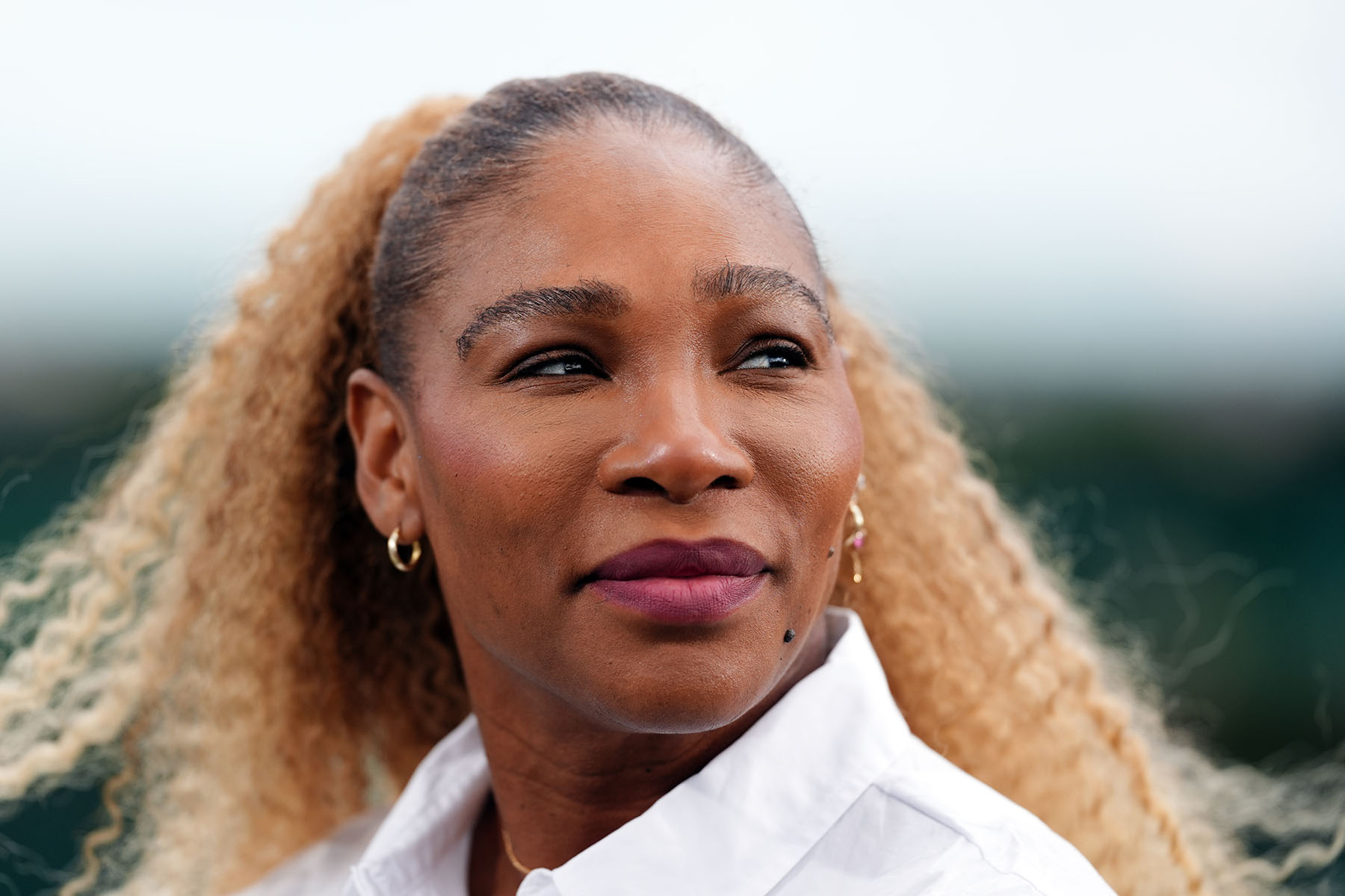 Serena Williams smiles as she speaks to the press at the All England Lawn Tennis and Croquet Club, London.