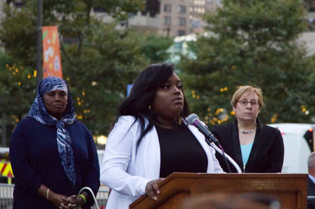 Tiara Parker stands at a lectern outside in Philadelphia