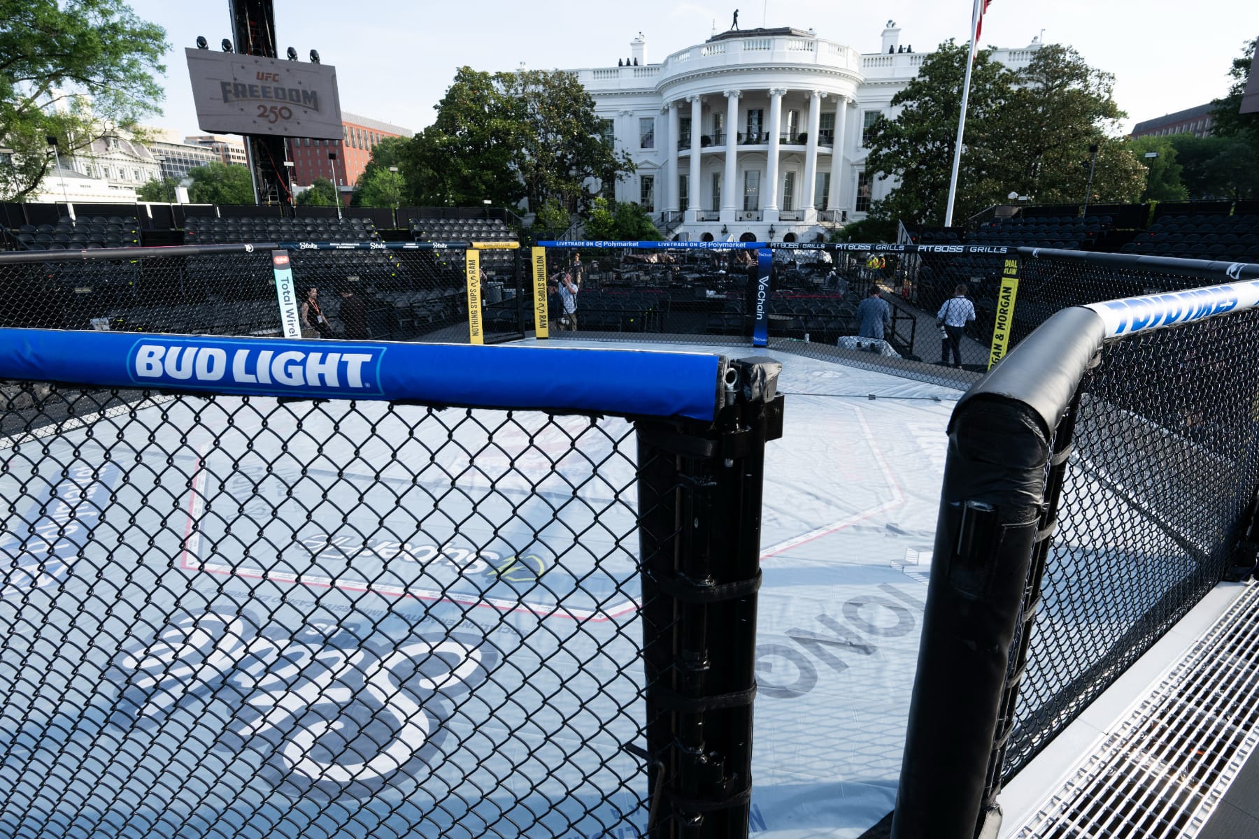 A UFC octagon with Bud Light advertisements on rails sits outside of the White House