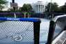 A UFC octagon with Bud Light advertisements on rails sits outside of the White House