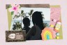 A collage featuring a silhouetted adult and child looking out at a palm-lined beach in Hawaii, layered with a hibiscus flower, maps, patterned paper, a sign reading “Aloha! It’s Kaua‘i’s spirit,” and colorful wooden toys.