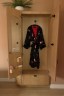 A robe hangs in a closet at a Tia clinic.