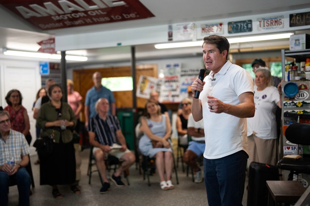 Rep. Seth Moulton talks with voters during an event in Chelmsford, Massachusetts.
