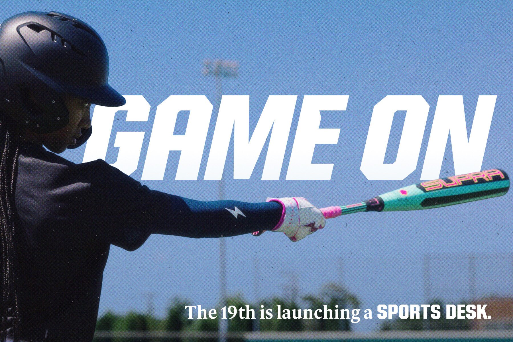 A person holding a bat with overlaying text reading Game On and The 19th is launching a sports desk.